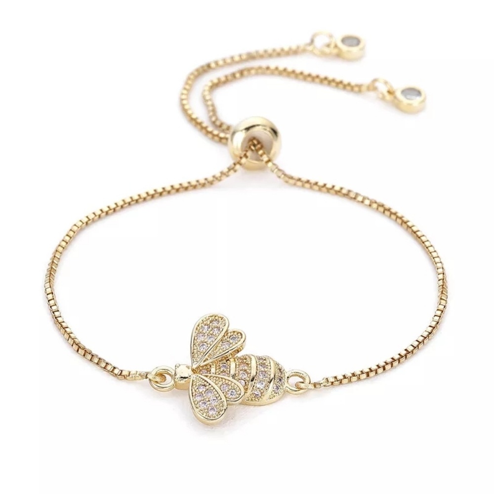 Zirconia bee charm bracelet gold color.